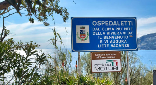 Skilt der forklarer at Ospedaletti har noget af Italiens mildeste klima