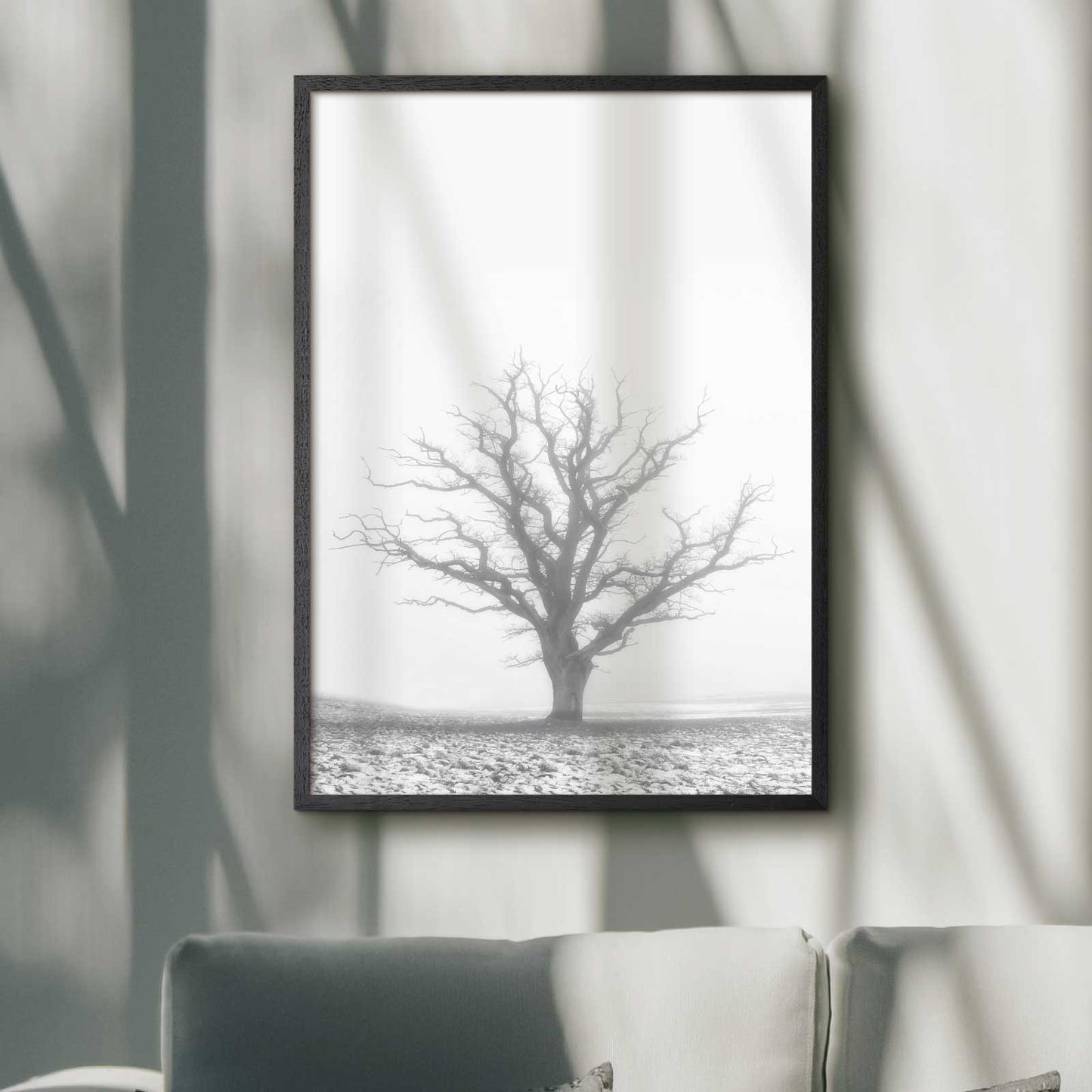 nature poster in black and white with a naked tree in mist