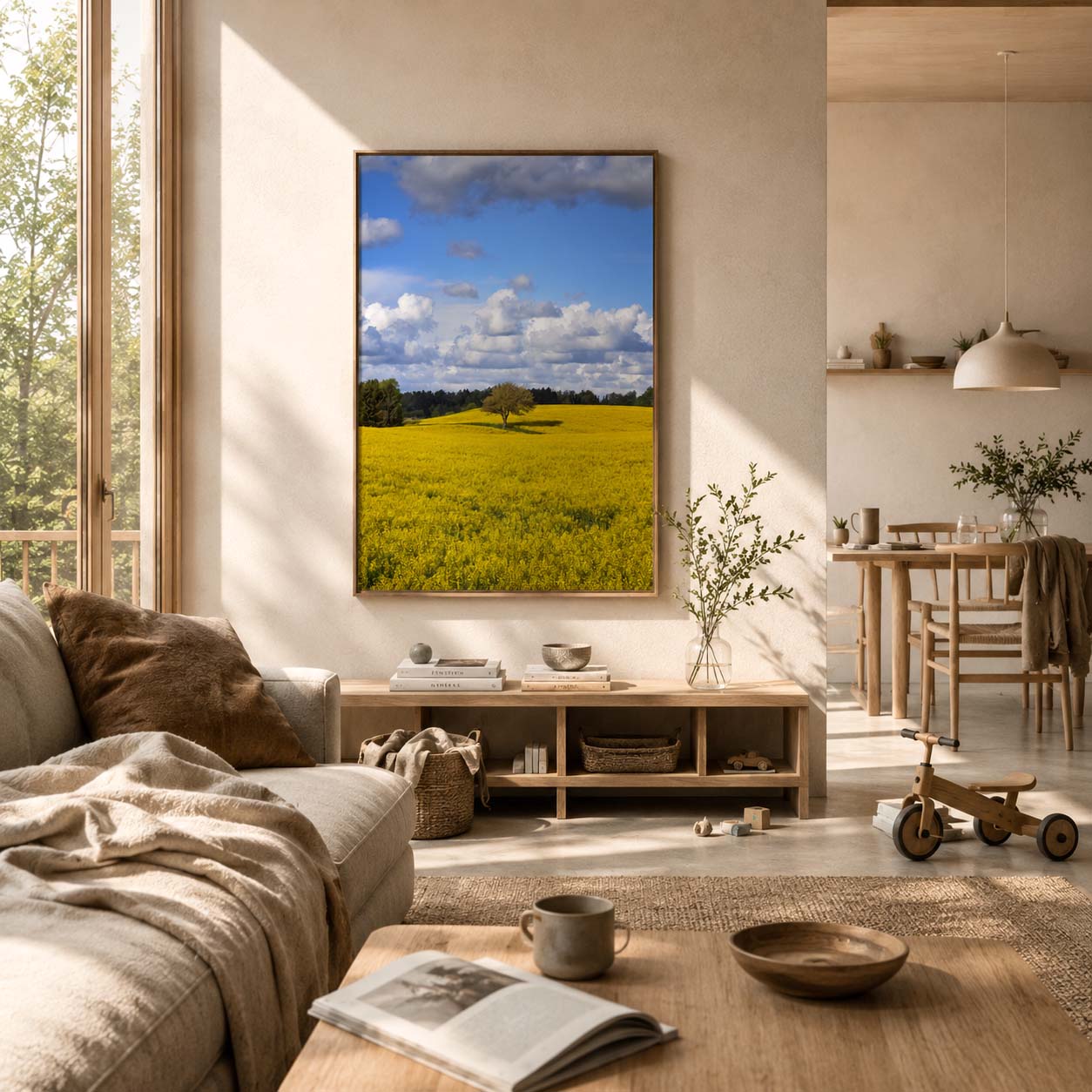 Naturplakat på en knaldgul rapsmark under en blå himmel