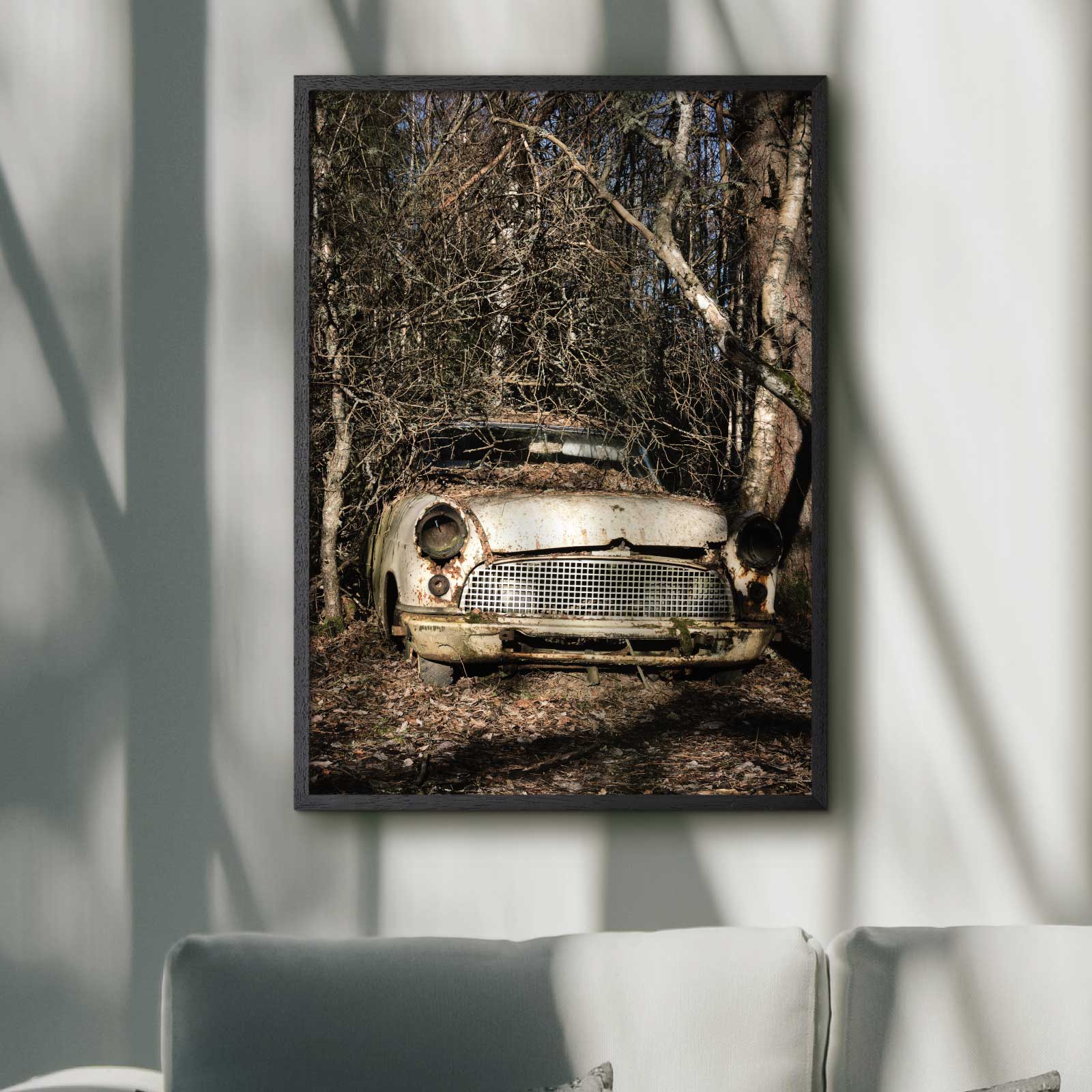 poster with a rusty carwreck out in a forest