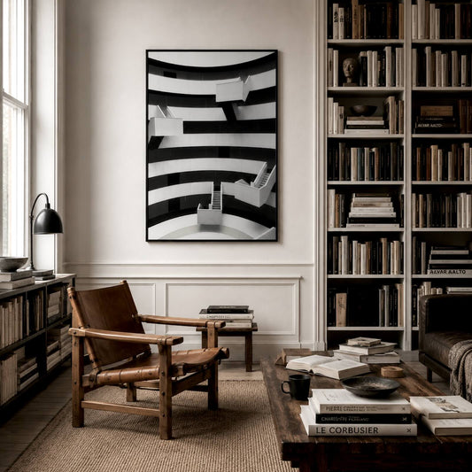Sort-hvid arkitekturplakat på væggen i et akademikerhjem