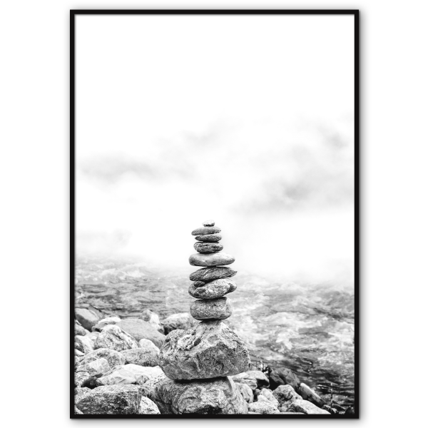 sort-hvid mindfulness plakat med balancerende små sten