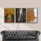 tre plakater med efterårsmotiver der hænger over en sofa