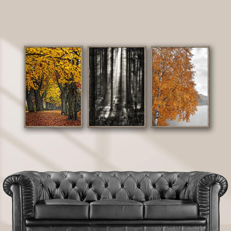 tre naturplakater med efterårsmotiver i mørke og orange gule farver